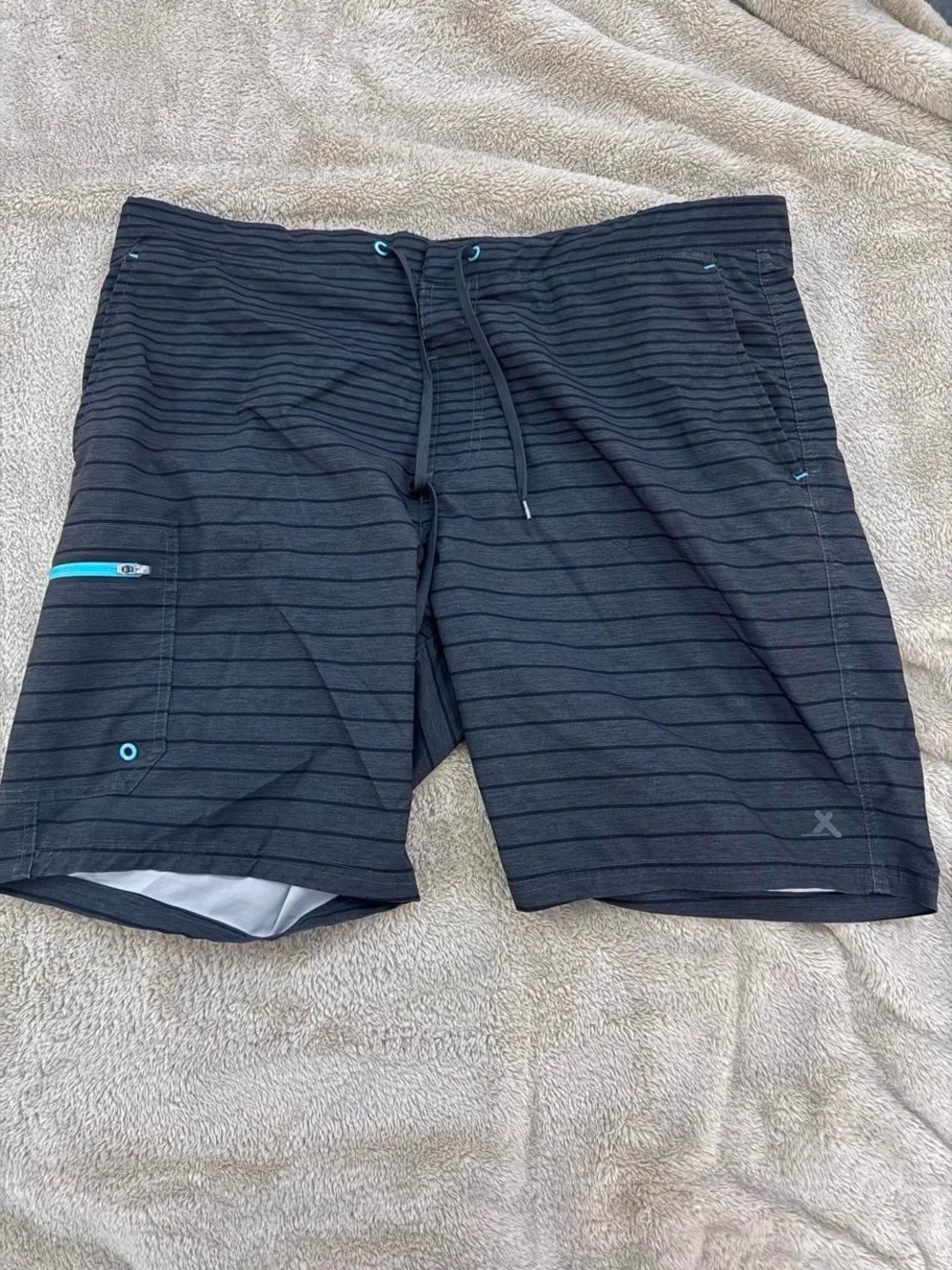ZeroXposur Black Striped Swim Hybrids with Aqua Accents